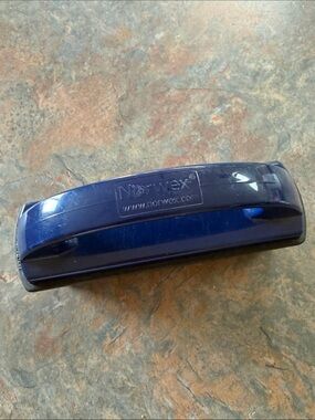 Norwex brand rubber brush.  Cleans rugs, dust mops, pet hair and furniture.